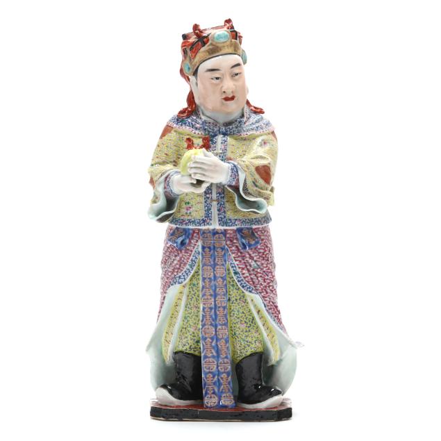 a-chinese-porcelain-famille-rose-figure-of-an-immortal