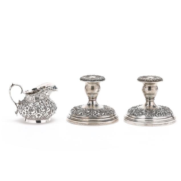 a-pair-of-baltimore-i-repousse-i-sterling-silver-candlesticks-and-a-creamer