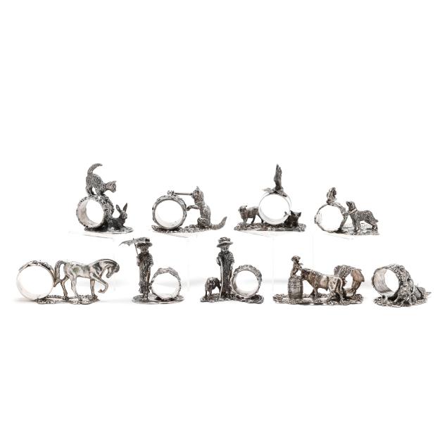 a-set-of-nine-silver-plated-figural-napkin-rings-in-the-victorian-style