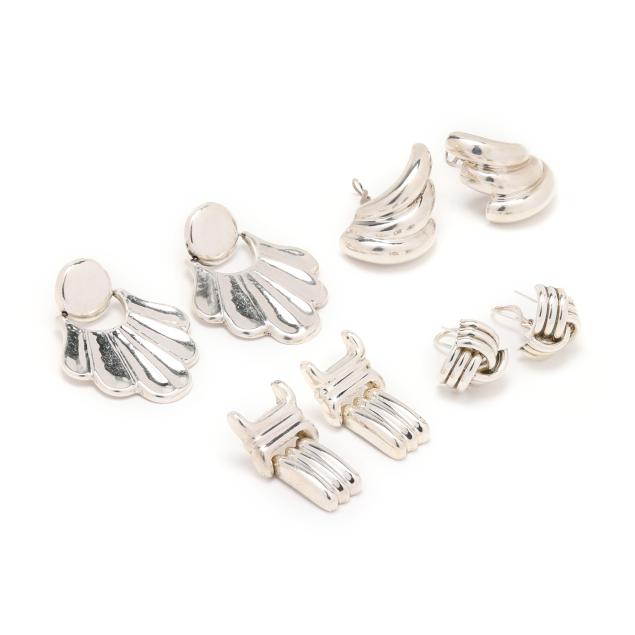 four-pairs-of-silver-earrings