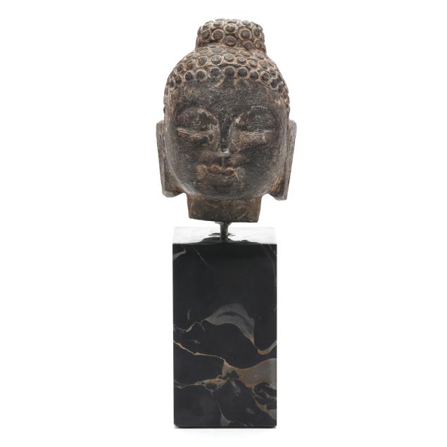 an-asian-carved-stone-buddha-head-with-stand
