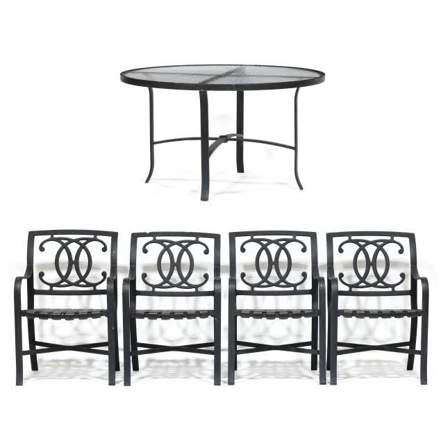 aluminum-and-glass-patio-table-and-four-chairs