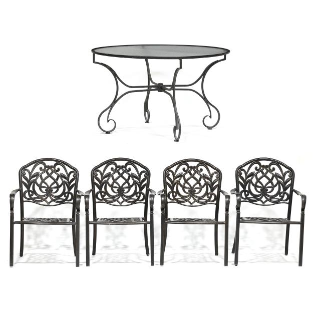 aluminum-and-glass-patio-table-and-four-chairs