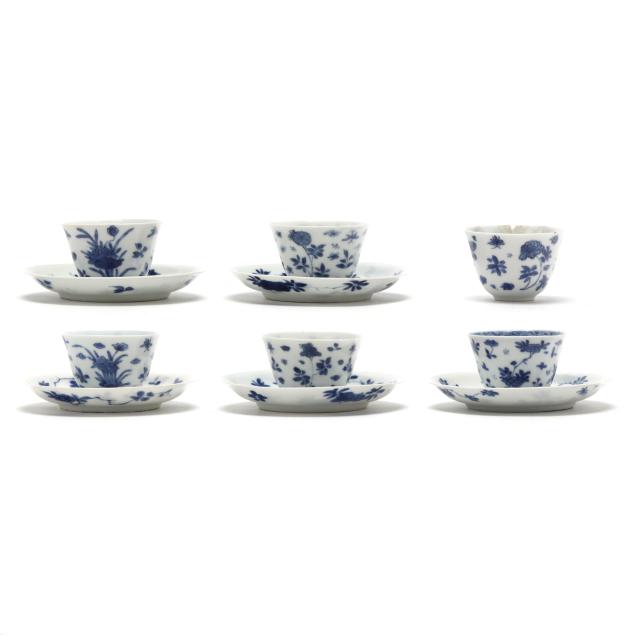 a-set-of-six-chinese-kangxi-blue-and-white-teacups-and-five-saucers-with-flora