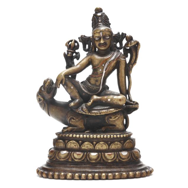 a-fine-and-rare-indian-silver-and-copper-inlaid-bronze-figure-of-manjushri