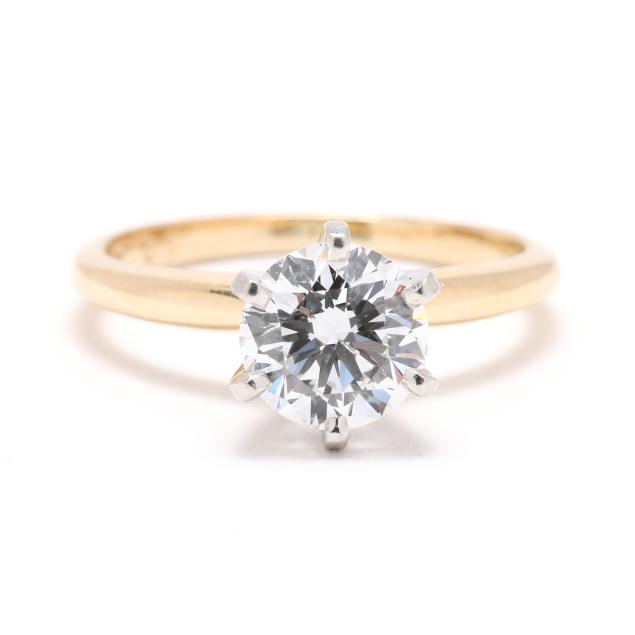 gold-platinum-and-1-28-carat-round-brilliant-cut-diamond-ring