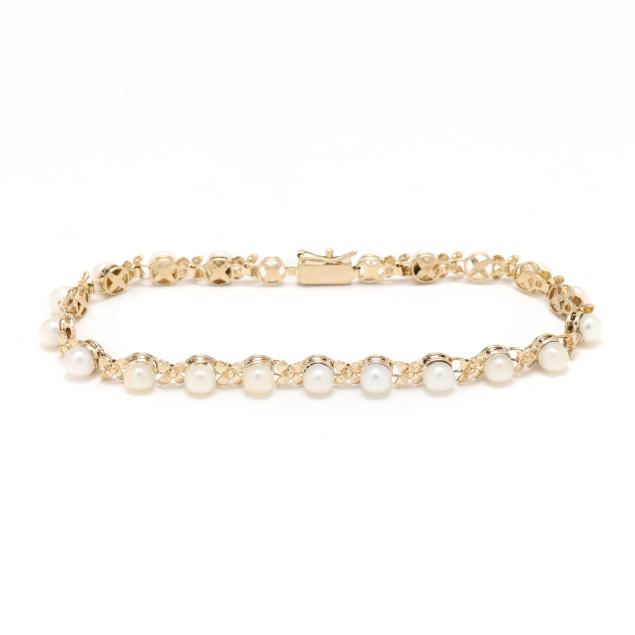 gold-and-pearl-line-bracelet