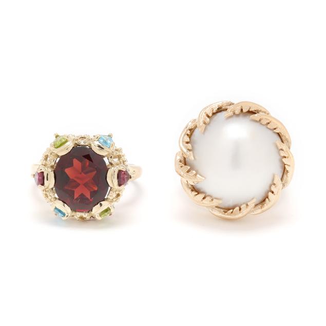 two-gold-and-gem-set-rings