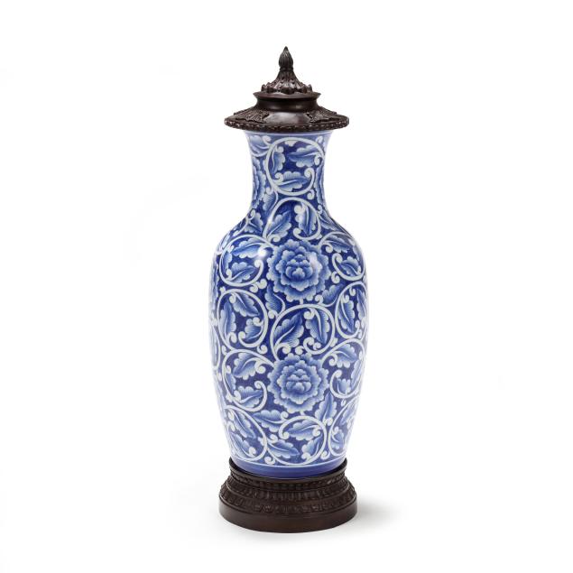 maitland-smith-blue-and-white-porcelain-vase-with-bronze-cover-and-stand