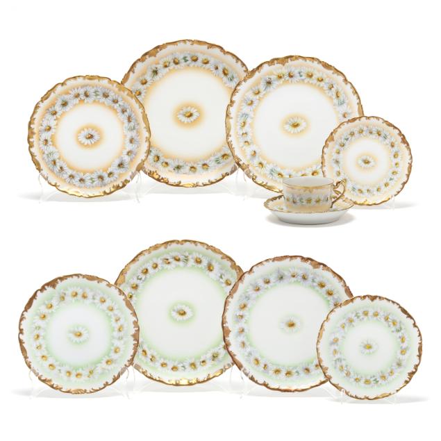 a-large-set-limoges-gilt-porcelain-dinnerware-with-daisy-pattern