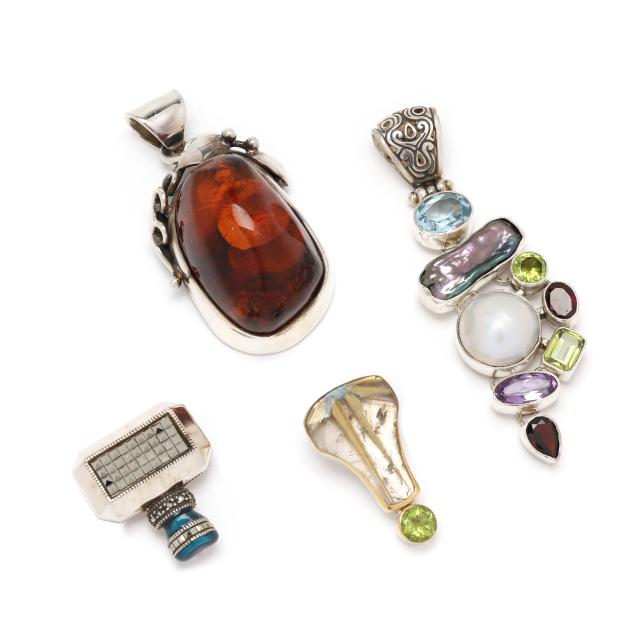 group-of-four-silver-and-gem-set-pendants-brooches