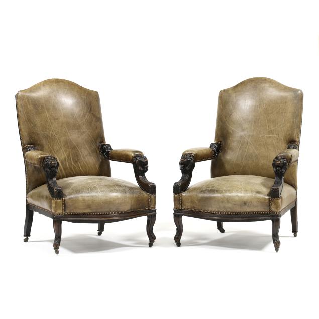pair-of-renaissance-revival-carved-and-leather-upholstered-great-chairs