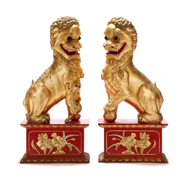 a-pair-of-large-gilded-carved-wood-foo-lions-with-stands
