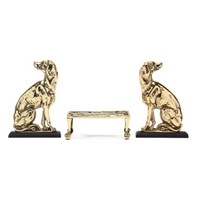 pair-of-brass-dog-doorstops-and-tiger-trivet