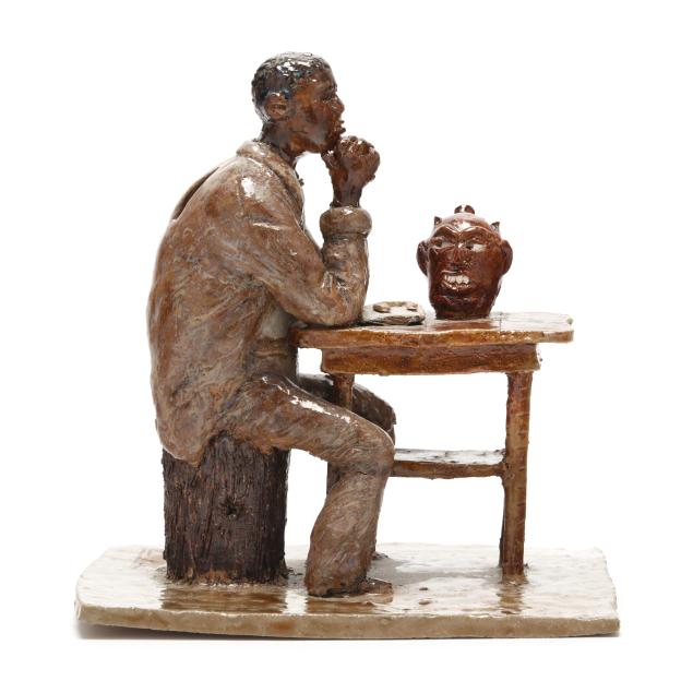 southern-pottery-figural-of-seated-man-and-face-jug-signed-eb