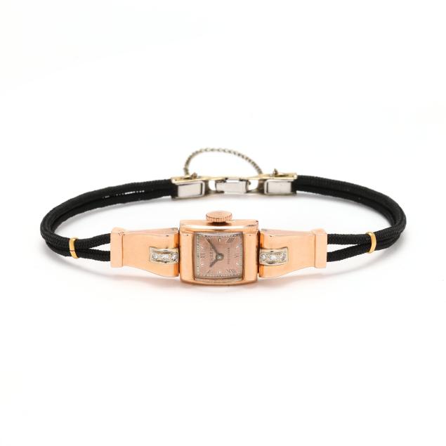 vintage-lady-s-gold-and-diamond-watch-gruen