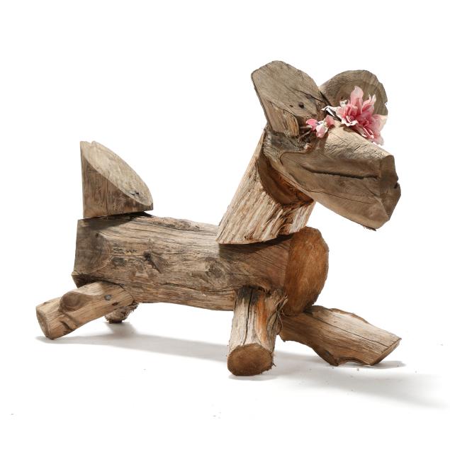 clyde-jones-nc-1938-2025-critter-with-pink-flowers