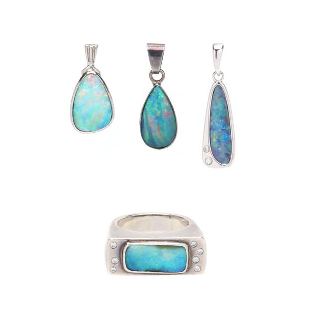 group-of-three-silver-and-opal-pendants-and-a-silver-and-opal-ring