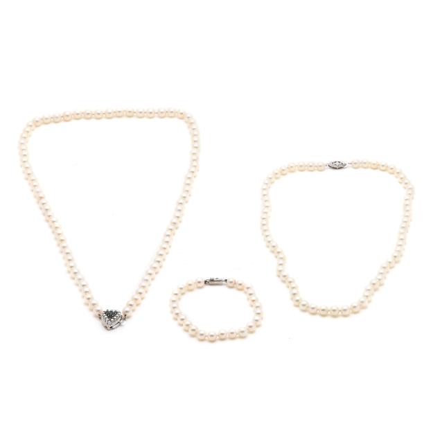 two-single-strand-pearl-necklaces-and-a-pearl-bracelet