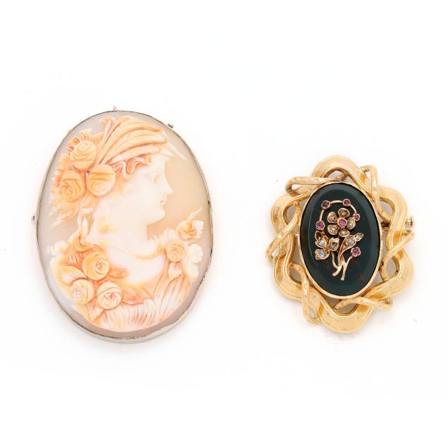 a-gold-bloodstone-and-ruby-brooch-and-a-white-gold-cameo-brooch