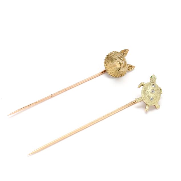 two-gold-stick-pins
