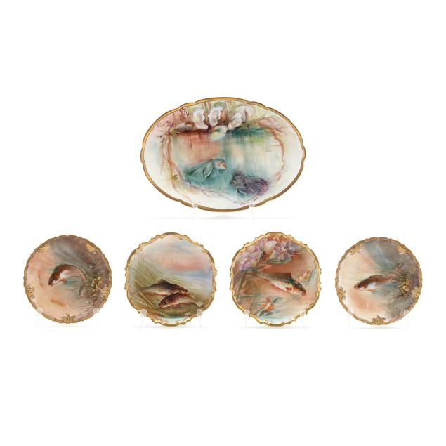 four-limoges-porcelain-plates-and-a-platter-with-aquatic-motifs