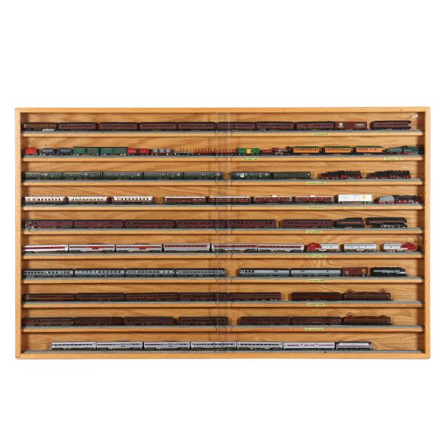 large-collection-of-model-trains-and-display-case