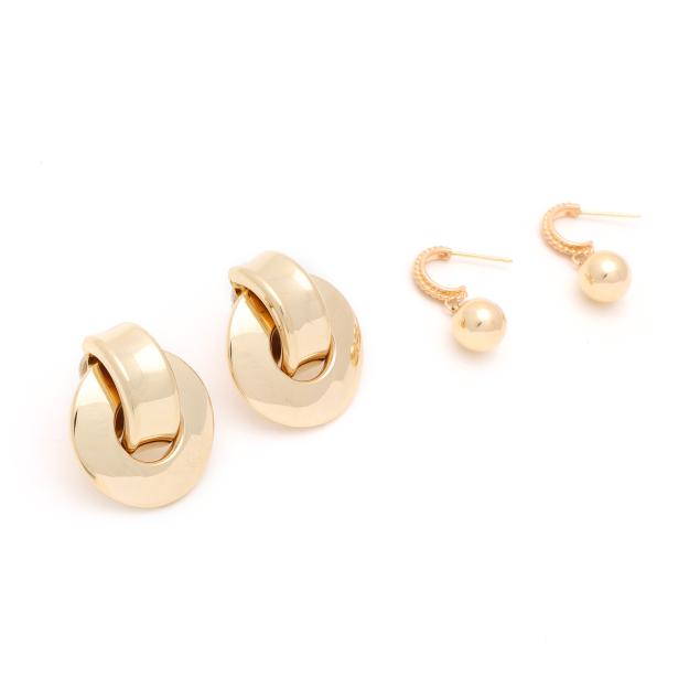 two-pairs-of-gold-earrings