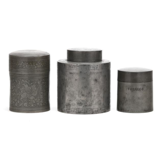three-antique-lidded-tobacco-jars-in-pewter-and-britannia-metal