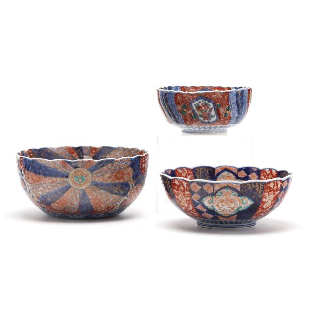 a-group-of-three-large-japanese-imari-porcelain-bowls