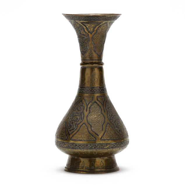 a-persian-mamluk-style-silver-inlaid-brass-vase