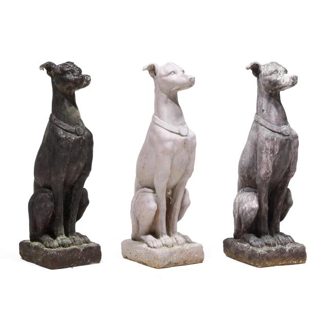 three-decorative-garden-sculptures-of-seated-greyhounds