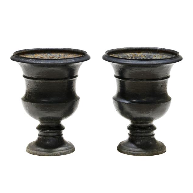 a-pair-of-cast-iron-campana-form-garden-urns