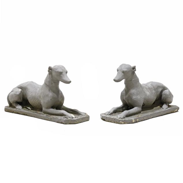 a-pair-of-painted-cast-stone-recumbent-hounds