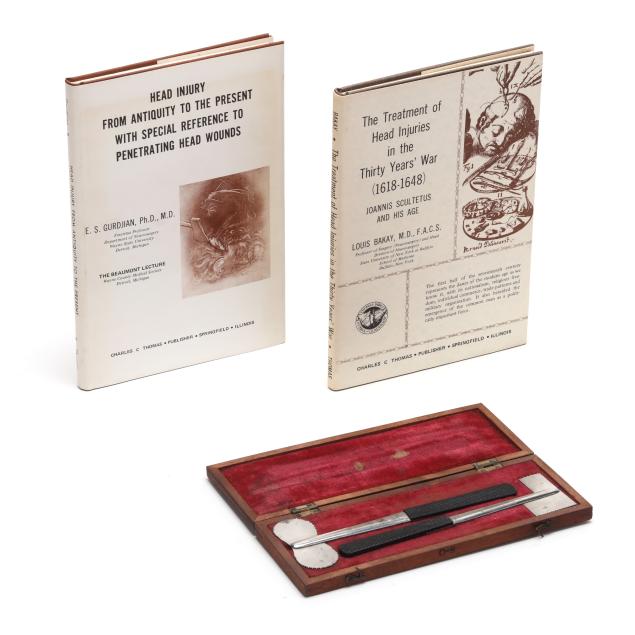 set-of-antique-hey-s-skull-saws-and-two-books-on-head-injuries