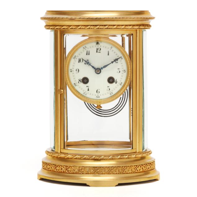 french-gilt-brass-oval-mantel-clock