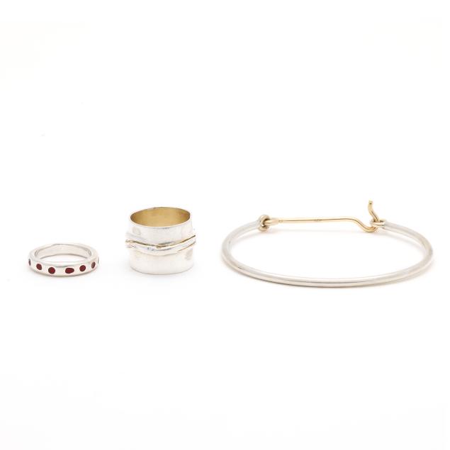 set-of-two-silver-bands-and-a-silver-and-gold-bangle-bracelet