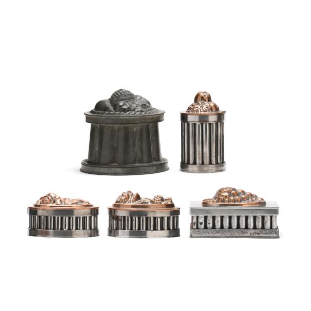 five-lidded-english-pewter-food-molds-each-with-a-different-fruit-motif
