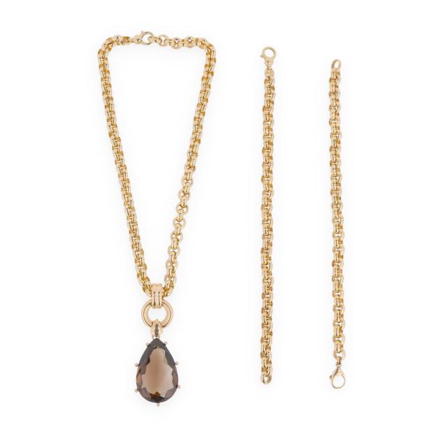 a-gold-and-smoky-quartz-necklace-pendant-and-two-gold-bracelets