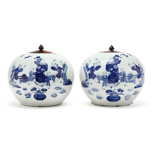 a-pair-of-chinese-blue-and-white-jars-with-mirrored-boy-decoration