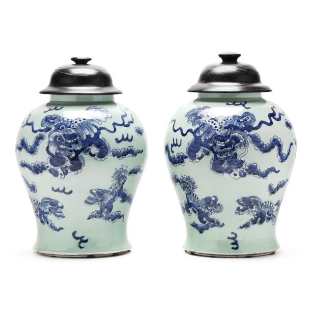 a-pair-of-chinese-celadon-ground-temple-jars-with-blue-and-white-foo-lions