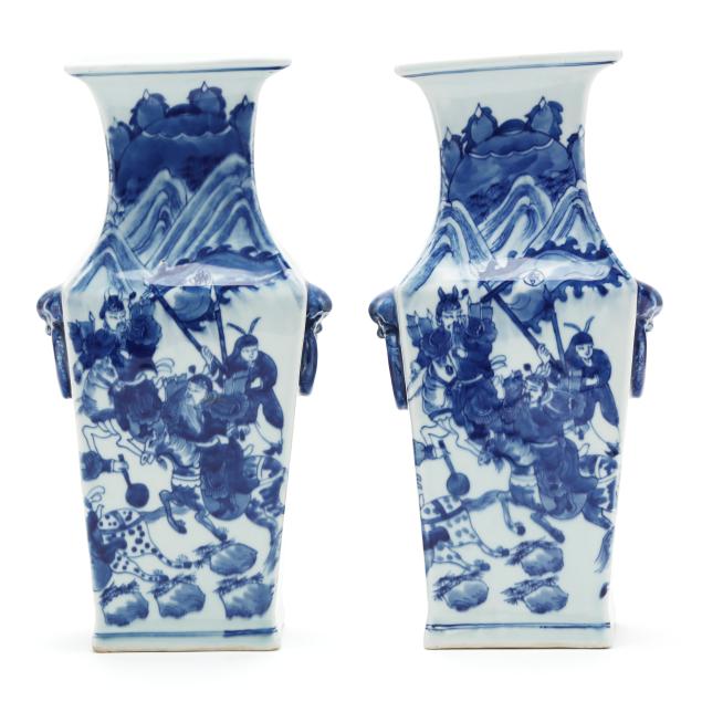 a-pair-of-chinese-blue-and-white-porcelain-vases-with-warriors