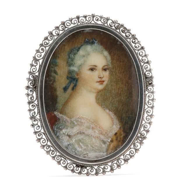 continental-school-19th-century-miniature-portrait-of-a-lady-in-silver-pendant