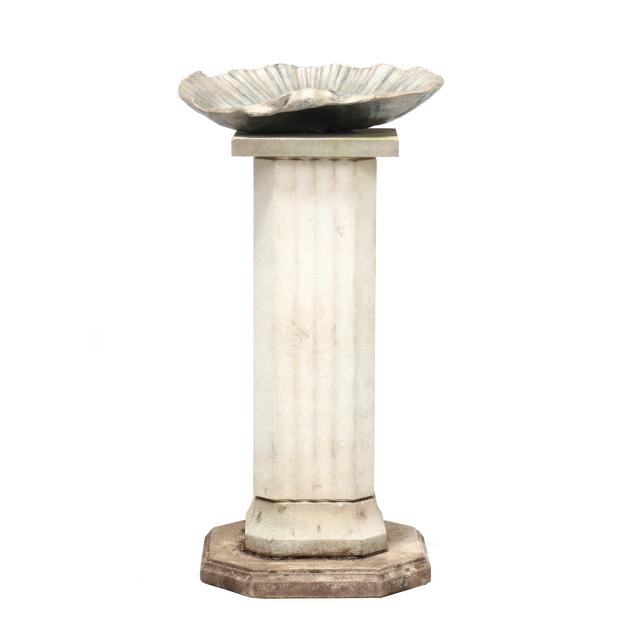 shell-form-lead-garden-font-on-cast-stone-plinth