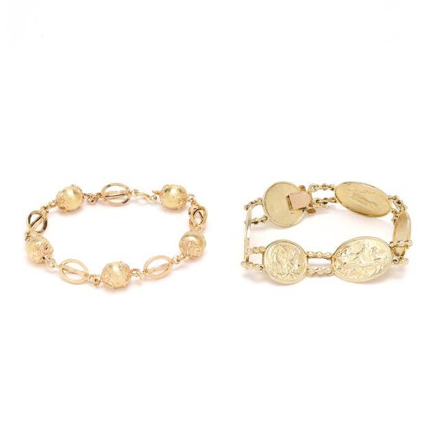 two-gold-link-bracelets