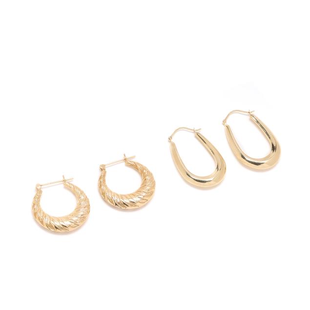 two-pairs-of-gold-hoop-earrings