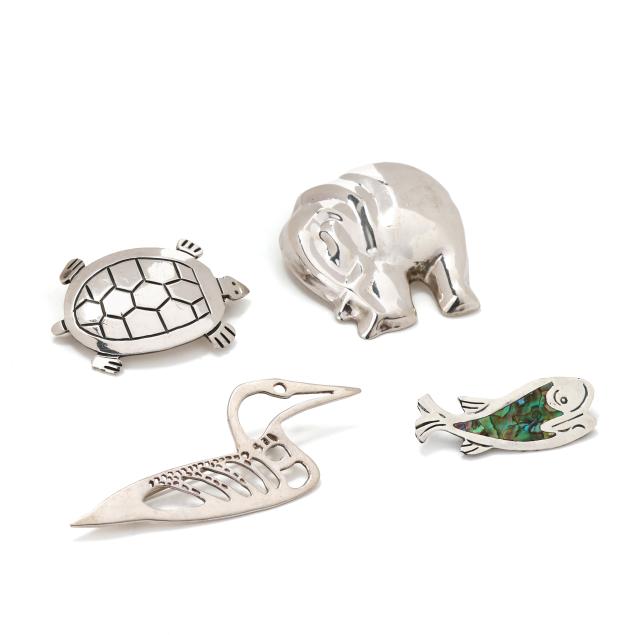 four-silver-animal-motif-brooches