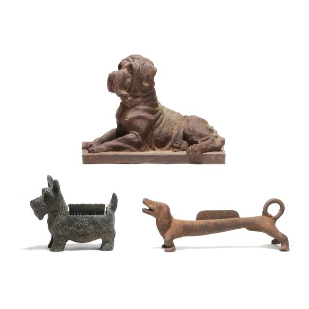 three-vintage-cast-iron-dog-form-ornaments