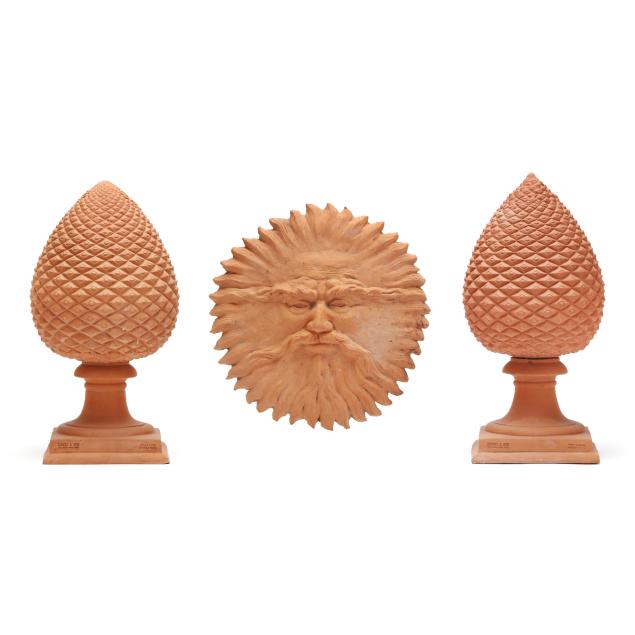 pair-of-italian-terracotta-pinecone-pedestal-ornaments-and-sun-face
