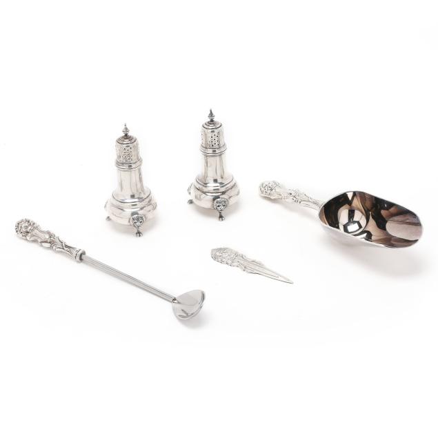 group-of-five-sterling-silver-accessories-with-lion-mask-motifs